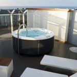 The Massive Suite features a private terrace (the largest onboard) with a jacuzzi, sun loungers, and more.