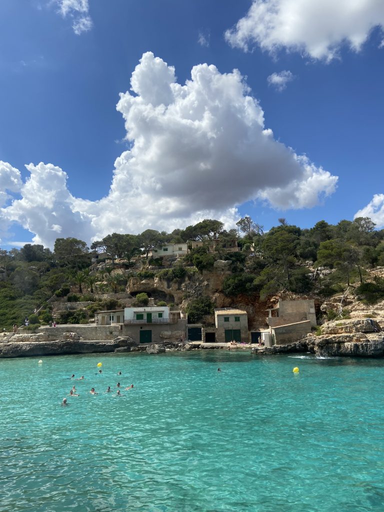 Turquoise water at Cala Llombards cove