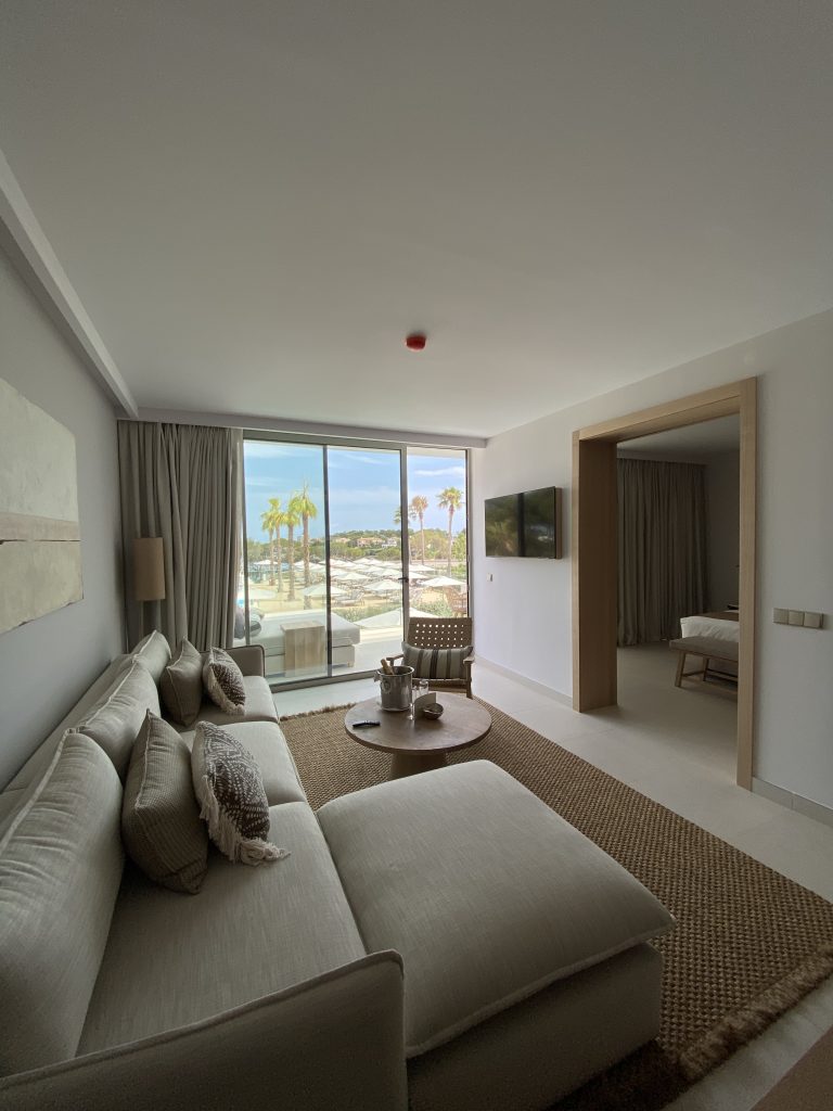 Interior shot of a One Bedroom Deluxe Suite at Ikos Porto Petro
